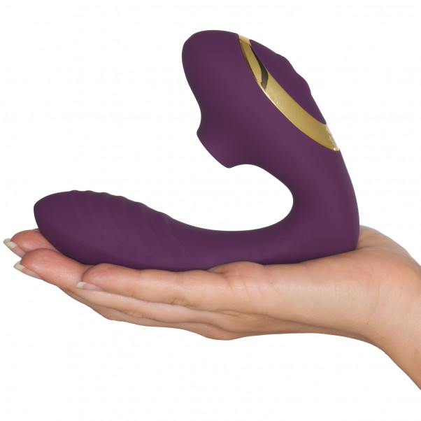 Tracy's Dog Pro 2 Klitorisstimulator Vibrator Produktbilde med hånd 50